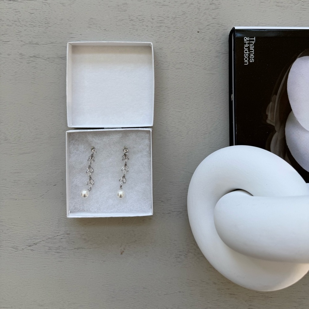 Pearl and silver earrings
